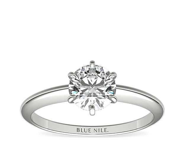 This platinum six-prong solitaire is the ultimate classic engagement ring style. Crafted to showcase your choice of diamond, six slim platinum prongs secure and support the center stone. The slender silhouette and polished finish of this solitaire exemplify timeless design, proving simple can be truly stunning.