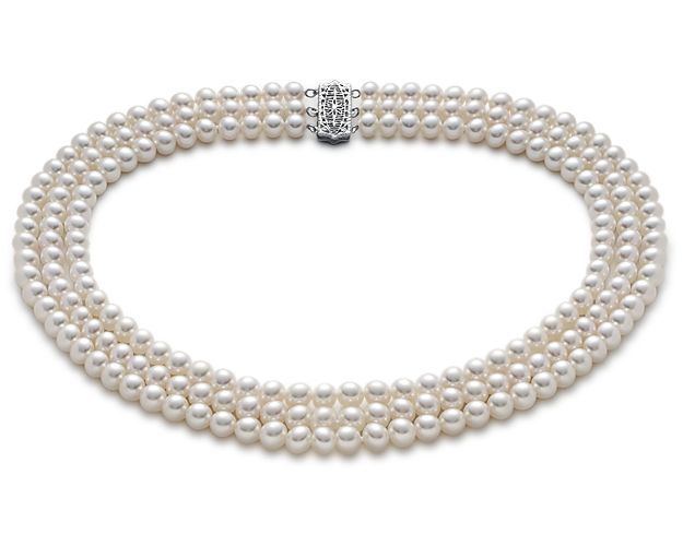 The warm luster of freshwater cultured pearls in three parallel strands with a wide 14k white gold filigree clasp give this necklace a truly elegant look.