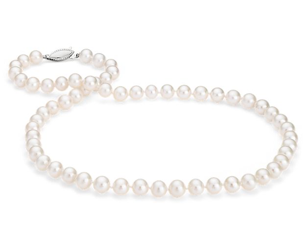Our classic pearl strand features nearly round freshwater cultured pearls strung on a 36" hand-knotted silk blend cord, secured with a 14k white gold safety clasp. Blue Nile gemologists ensure that our pearls meet the highest quality expectations, ensuring you the best value.