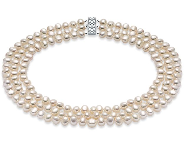 This fashionable pearl necklace features 3 strands of baroque freshwater cultured pearls strung together with a sterling silver decorative clasp.