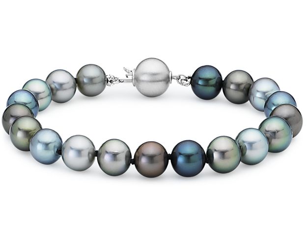 Rich in luminous color, this pearl bracelet showcases varying hues of Tahitian cultured pearls and is finished with an 18k brushed white gold clasp.