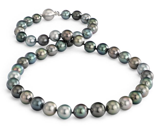 Lustrous and decadent, this pearl necklace showcases varying hues of Tahitian cultured pearls to create a unique necklace finished with an 18k brushed white gold clasp.