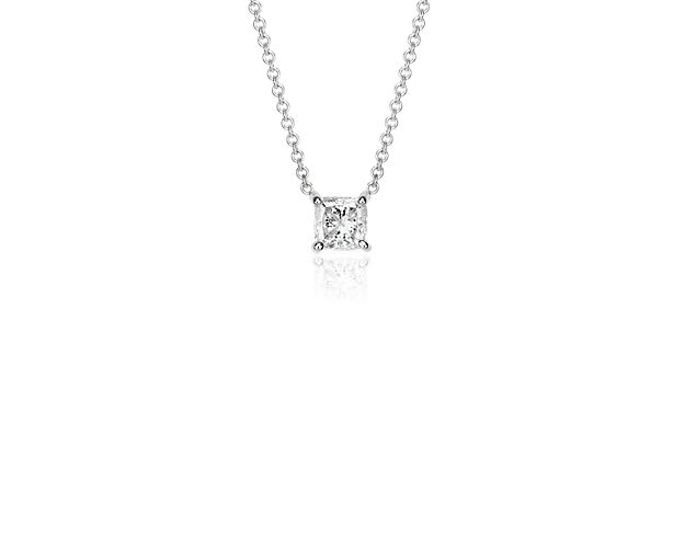 Singular brilliance, this diamond pendant features a cushion cut diamond set in 14k white gold that is suspended on a cable chain necklace.