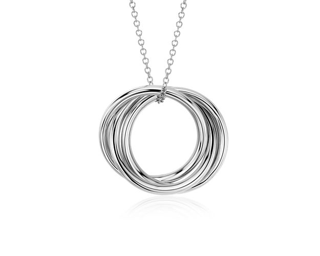 Three hollow, lightweight rings crafted in polished 14k white gold, interlock to form a symbol of infinity that hangs from a classic cable chain secured with a lobster claw clasp. The symbolic nature and refined style of this pendant make it a perfect gift for bridesmaids, best friends, or the one you love.