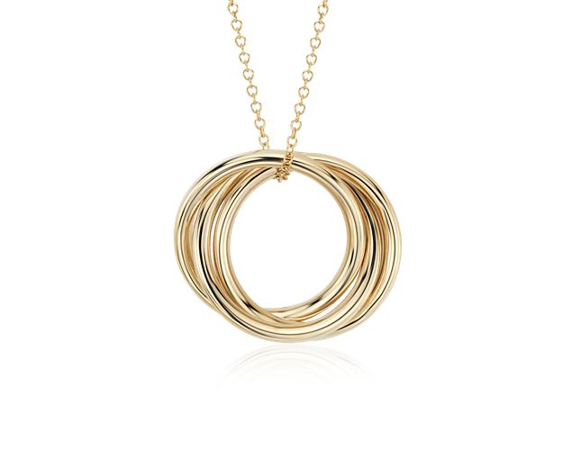 Three hollow, lightweight rings crafted in polished 14k yellow gold, interlock to form a symbol of infinity that hangs from a classic cable chain secured with a lobster claw clasp. The symbolic nature and refined style of this pendant make it a perfect gift for bridesmaids, best friends, or the one you love.