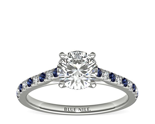This striking platinum setting features alternating micropavé sapphires and round diamonds; the perfect complement to your choice of center diamond.