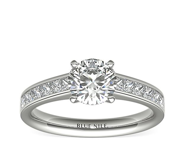 Elegant and unique, this diamond engagement ring showcases twelve princess-cut diamonds that are channel-set in platinum to accent your center diamond. Setting includes ½ carat total diamond weight.