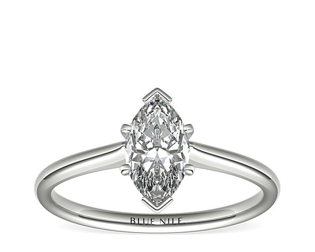 Elegant in its simplicity, this petite solitaire crafted in platinum is a beautifully classic frame for your choice of center diamond.