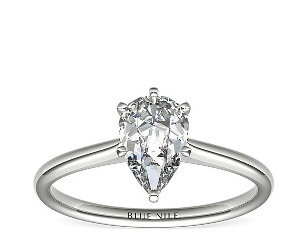 Elegant in its simplicity, this petite solitaire crafted in platinum is a beautifully classic frame for your choice of center diamond.