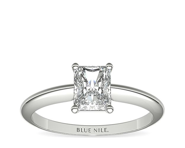 Let your diamond shine brilliantly in this classic 14k white gold four-prong solitaire engagement ring. The slim silhouette and polished finish of this timeless style exemplify timeless style. Select from a variety of diamond shapes to create the perfect classic solitaire engagement ring for you.