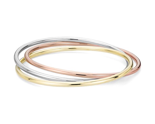 The Trio bangle bracelet is on the short list of favorites. Three hollow bands in 14k Italian white, rose, and yellow gold intertwine for a mixed-metal look that is a versatile essential.