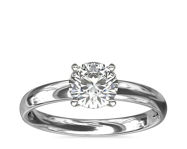 Thanks to its striking simplicity, solitaire engagement rings are perhaps our most popular style. This one, crafted in 14k white gold, features a rounded inside edge for comfort. Pair it with a matching wedding band to complete the set. A six-prong ring head, which provides extra security, is available upon request for select diamond shapes.