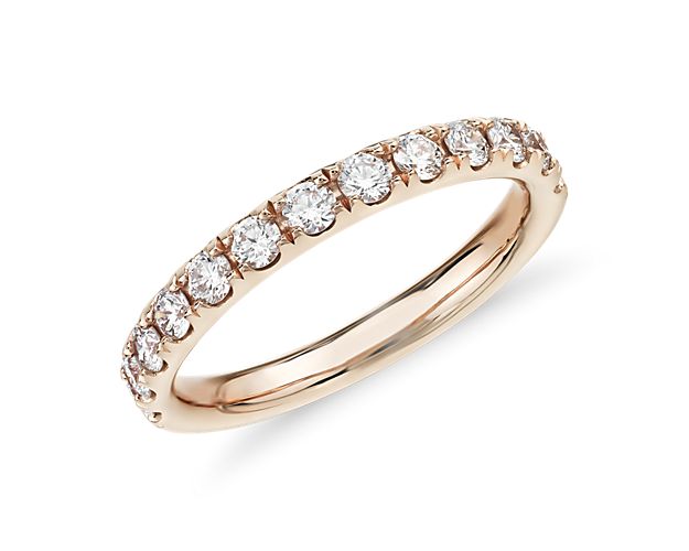 Shine bright with the elegant beauty of this 14k rose gold diamond ring adorned with a row of dazzling pavé-set round diamonds.