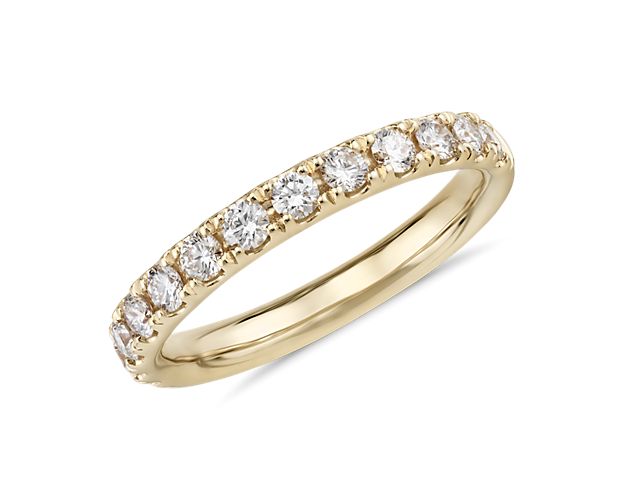 Shine bright with the elegant beauty of this 18k yellow gold diamond ring adorned with a row of dazzling pavé-set round diamonds.