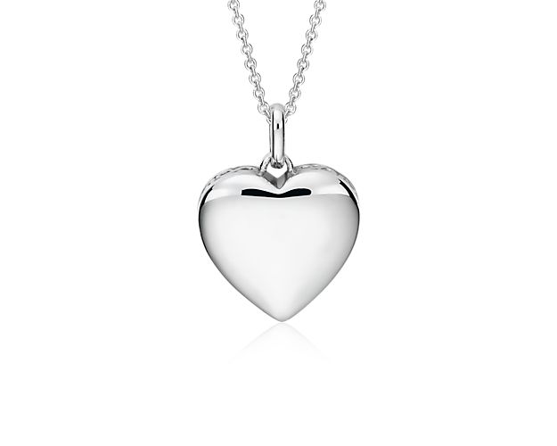 Inherently sentimental, this infinity heart pendant is crafted of solid sterling silver with carved infinity symbols on its decorative edge. The matching cable chain can be worn at 16 or 18 inches for versatility.
