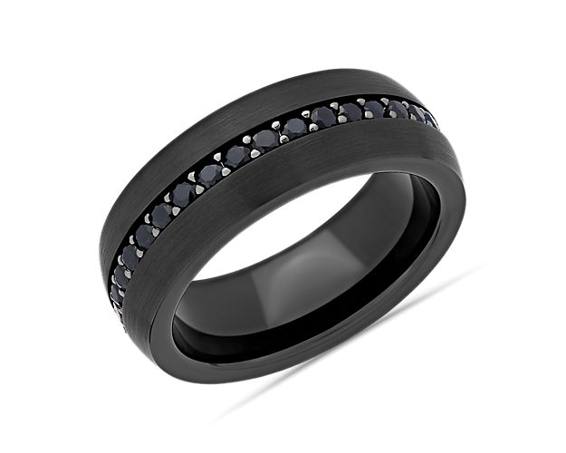 This tungsten wedding band features deep blue sapphires set into the center of the ring for a striking presentation.