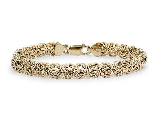 Recalling the richness of a bygone era, our classic Byzantine bracelet is crafted to be both voluminous and lightweight. Alternating textured and polished, hollow 18k Italian gold links form a distinctive, historically-inspired pattern.
