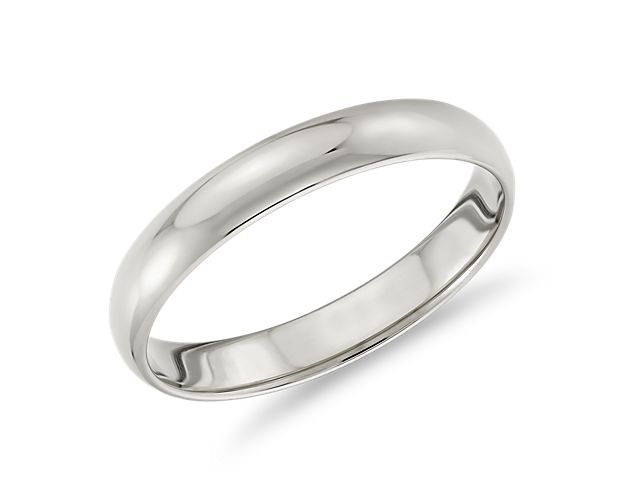 This classic platinum wedding ring will be a lifelong essential. The light overall weight of this style and its slender, low profile aesthetic make it feel "barely there" and perfect for everyday wear. The high polished finish and goes-with-anything styling are a perfect complement to any platinum engagement ring.