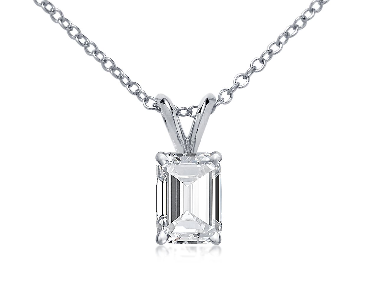 Custom diamond pendant necklace with an emerald diamond