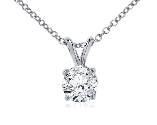 An elegant 18k white gold, four-prong setting highlights the brilliance of your choice of diamonds. Pendant is suspended on a double-bail from an 18k white gold adjustable cable chain 16-18inches in length.