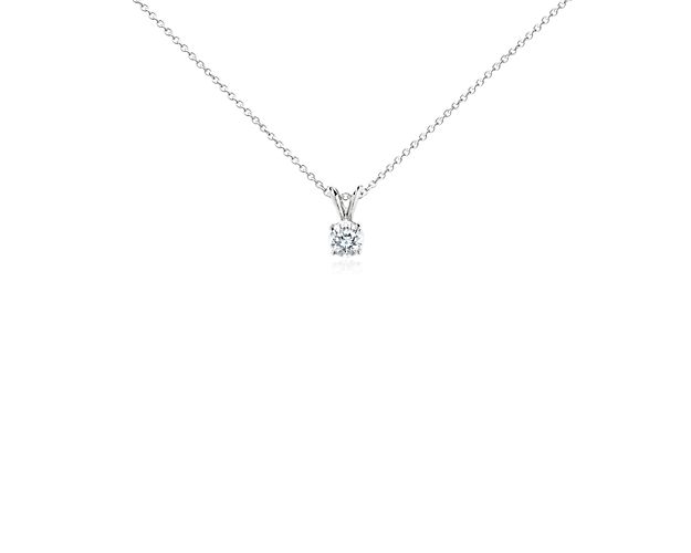Indulge with this solitaire diamond pendant, featuring a 14k white gold cable chain necklace and lobster claw clasp.