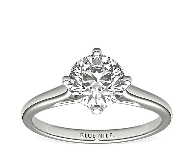 Show your love with this 14k white gold engagement ring, featuring an east west prong setting for a brilliant solitaire diamond.