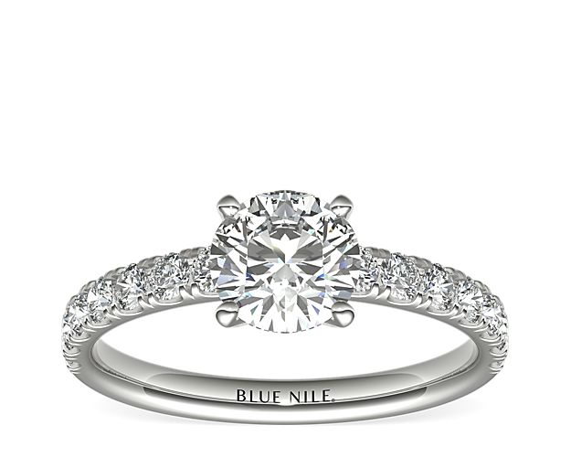Eyes will be fixated on this immaculate platinum engagement ring, showcasing pavé-set diamonds that complement your choice of center diamond.