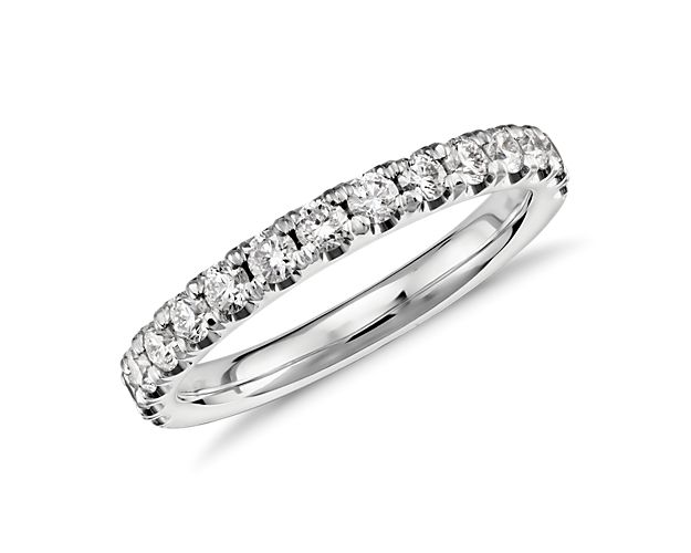 Accentuate the moment with this beautiful diamond ring, showcasing french pavé-set round diamonds.