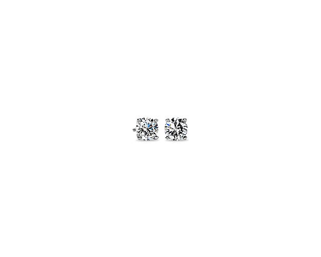 Brilliance is captured in these diamond stud earrings showcasing round diamonds in four-prong settings of 14k white gold. The pair amounts to a 3 carat total diamond weight.