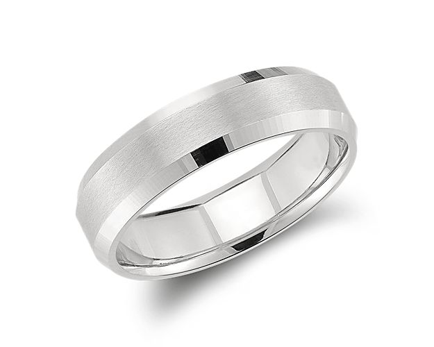 Solidify your love with this symbolic platinum wedding ring, showcasing a classic lathe emery finish and spun beveled edges.