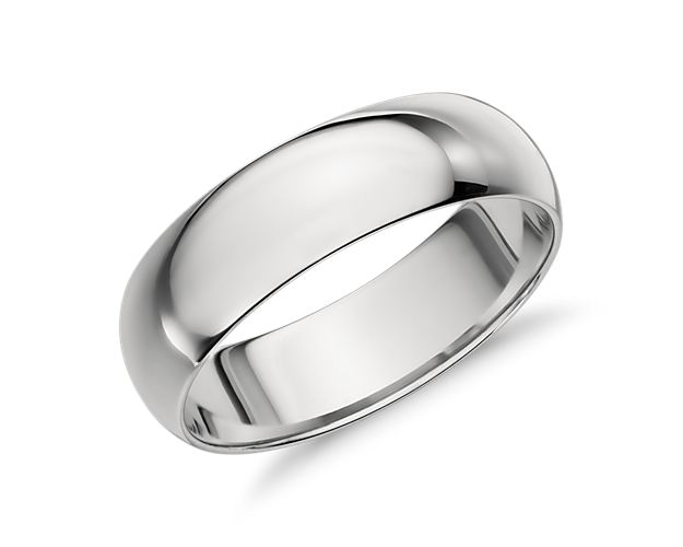 This mid-weight, high polish, platinum wedding ring has a traditional higher domed exterior profile and a substantial 6mm width. Curved inner edges make this style extra comfortable for everyday wear.