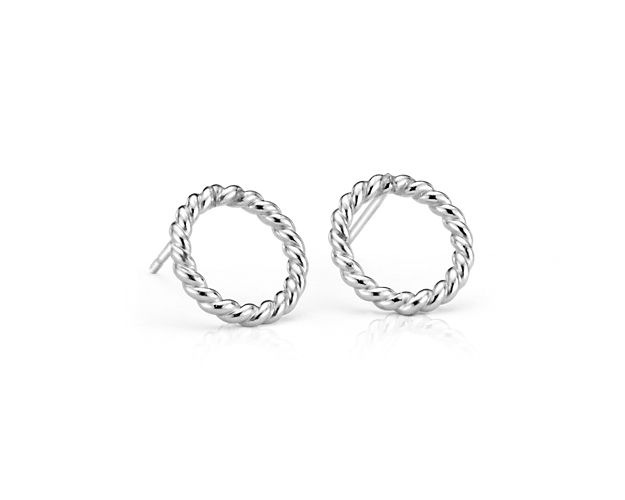 Get graphic impact with a hint of nautical flair from these rope circle earrings. Crafted in polished sterling silver, these petite stud earrings offer an open, lightweight design that goes with everything and offers a clean, classic look.