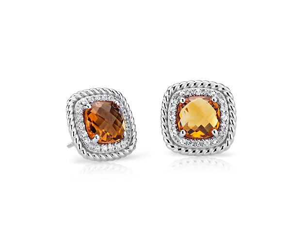 Two glittering, cushion-cut citrines are surrounded by a halo of white topaz and accented with a rope design that creates a rich, sophisticated feel. These stud earrings, crafted out of sterling silver, are a classy addition to any look.