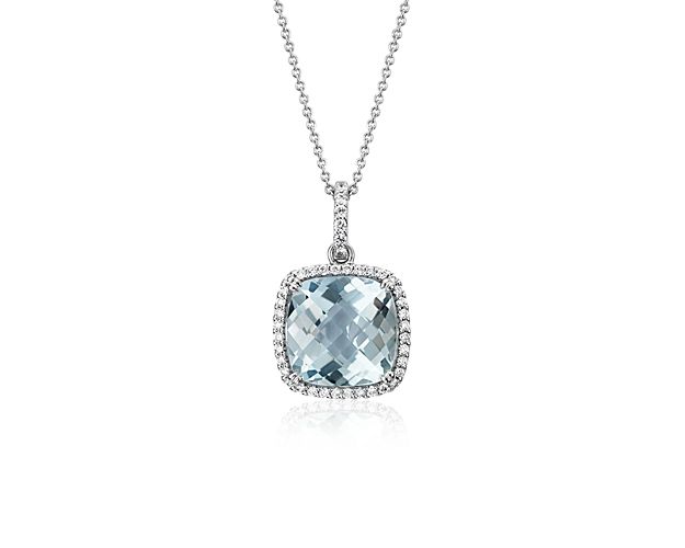 The lush cushion-cut aquamarine of this 14k white gold pendant necklace commands attention. A halo of brilliant round diamonds provides a luminous finish. Adjustable cable chain length delivers a just-right fit.