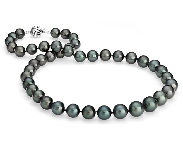 Redefine a timeless style with the opulence of this strand of black Tahitian cultured pearls, showcasing multi-hued overtones and high luster. The hand-knotted, 18-inch strand is finished with a 18k white gold, fluted-ball safety clasp. Blue Nile gemologists ensure that our pearls meet the highest quality expectations, ensuring you the best value.