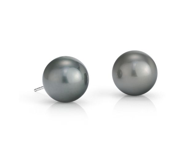 Each earring holds a rare, black, Tahitian cultured pearls mounted on 18k white gold posts with push backs for pierced ears.