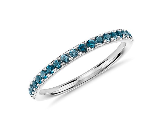 A dainty row of brilliant round topaz in vivid blue are pavé set in this Riviera ring crafted of 14k white gold. A sweet sentiment on its own, or a shimmering statement when stacked with other gemstone and diamond bands from the Riviera collection.