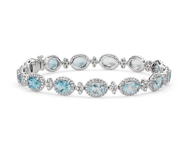 A great complement to any style, this gemstone bracelet showcases stunning aquamarine gemstones accented with a sparkling halo of pavé-set diamonds framed in 18k white gold.