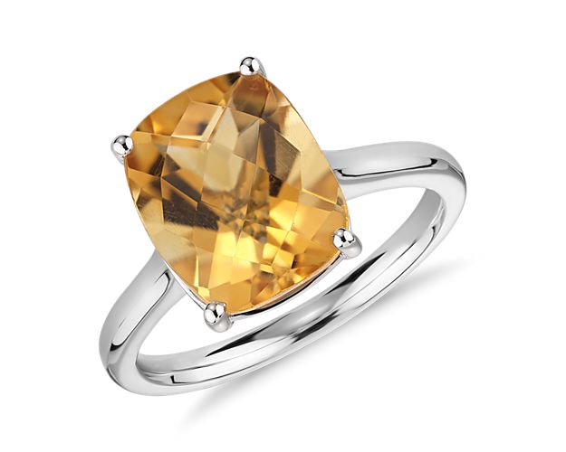 Sunny yellow citrine makes a bold statement in this fashion-forward cocktail ring crafted of 14k white gold.