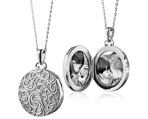 This vintage-inspired locket, forged of sterling silver, features a classic floral design and hangs off a 30 inch chain. A perfect piece to hold memories close to your heart, the classic locket can hold your own unique stories.