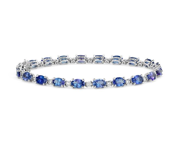 Captivating in color, this bracelet features vibrant tanzanite gemstones accented with sparkling round diamonds framed in 14k white gold.