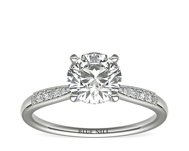 Complement your center diamond perfectly with this 14k white gold engagement ring accented with pavé-set diamonds along the shank.