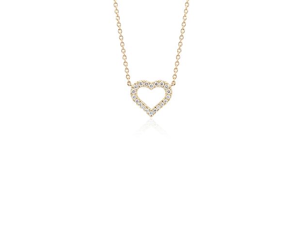 A heartfelt gift, this mini diamond necklace features round diamonds pavé-set in a tiny open heart design of 14k yellow gold with a matching 16 inch cable chain necklace.