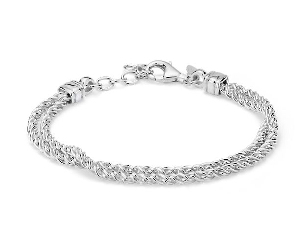 This double chain bracelet is classic and chic. Crafted of smooth, wheat link-style chain, this on-trend style features two chains with a single lobster clasp that can be adjusted from 6-1/2 inches to 7-1/2 inches, perfect for laying with other bracelets. It's the perfect style for every outfit.