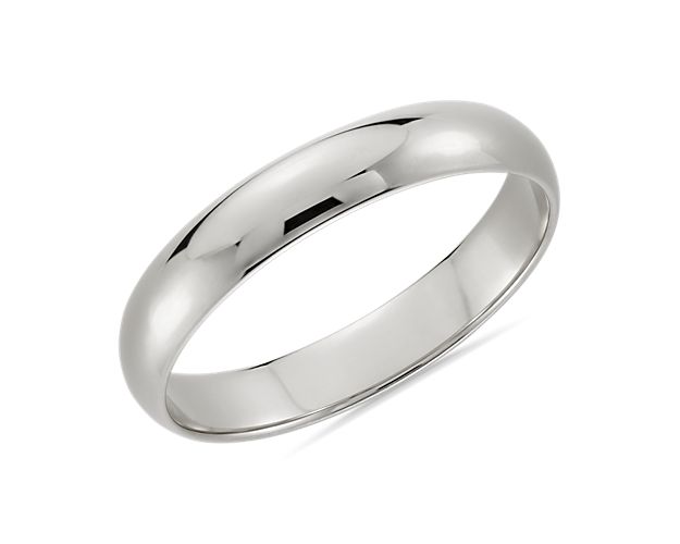 This classic 14 white gold wedding ring will be a lifelong essential. The light overall weight of this style, its classic 4mm width, and low profile aesthetic make it perfect for everyday wear. The high polished finish and goes-with-anything styling are a timeless design.