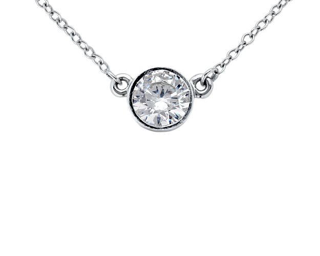 Subtly modern, this bezel solitaire pendant setting is crafted in 14k white gold with a matching cable chain necklace to complement your round diamond of choice.
