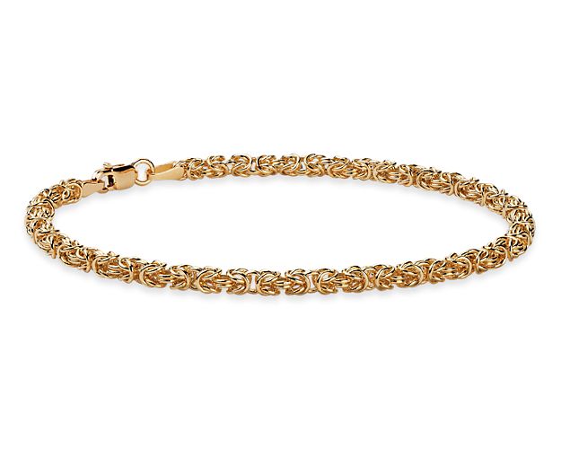 A weave of polished, hollow links in Italian 14k gold form our lightweight, distinctive petite Byzantine bracelet.