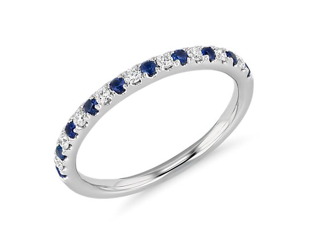 Delicate and brilliant, this sapphire and diamond ring is crafted in a petite design of 14k white gold, featuring alternating pavé set diamonds and sapphires.