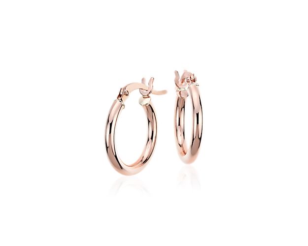 A style essential, these petite hoop earrings are crafted from 14k rose gold tubing for a polished, lightweight look, finished with a latch back closure.