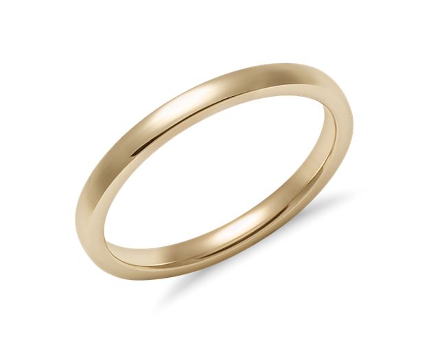Styled for a modern look, this high polish, 14k yellow gold, low-dome comfort-fit wedding ring has a premium-weight feel. The contemporary low-profile outside and gently curved interior edges make for everyday comfortable wear.